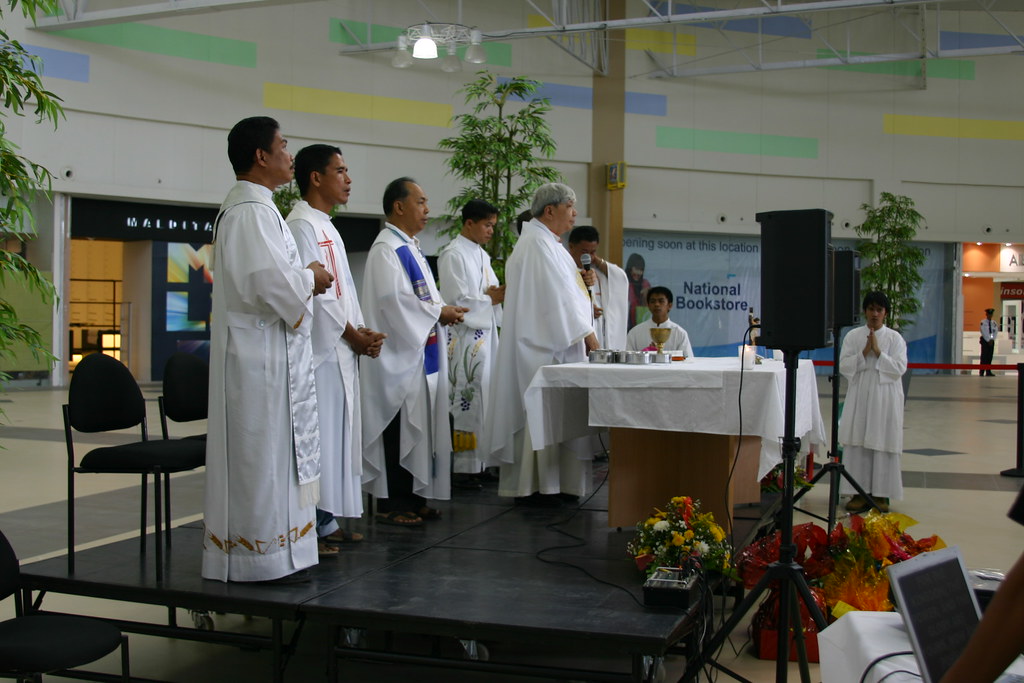 Bishop Dinualdo Gutierrez and other priests officiate a mass during the opening of Robinsons Place GenSan last September