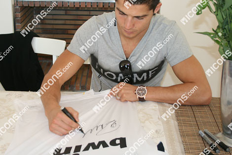 cristiano ronaldo real madrid shirt. Cristiano Ronaldo signs Real