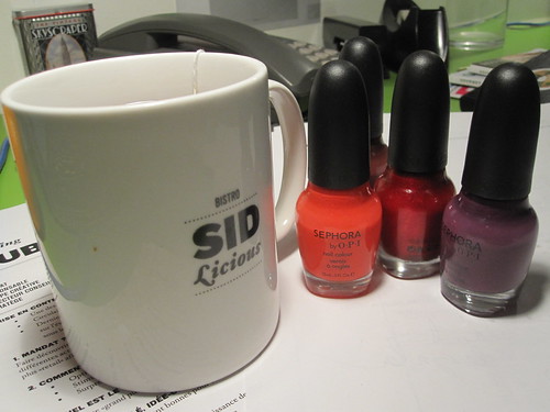 Cup of tea (free) with my new nail polishes (not free)
