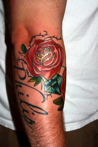 Rose tattoo designs are considered as one of the most popular tattoos there