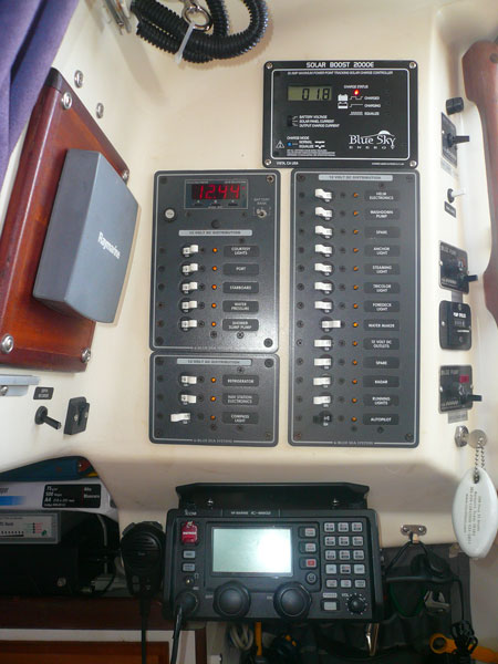 a shot looking straight aft at the DC electrical panels, bilge control area, SSB, and up on the left is the inside depth sounder