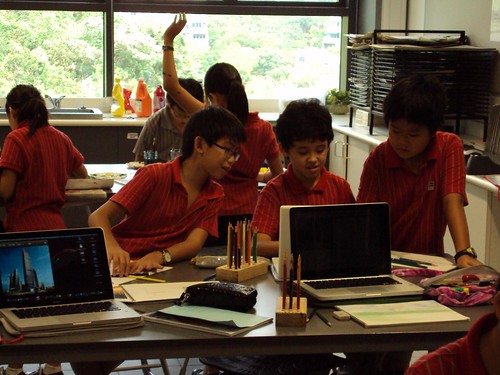 Students in Hong Kong working at Discovery College