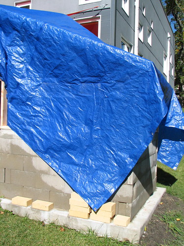 oven under the big blue tarp