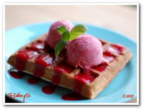 Waffle with Smooth Raspberry Sauce and Strawberry Frozen Yogurt