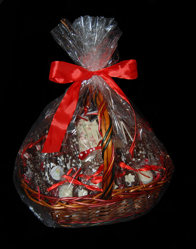 medium sized custom holiday themed gift basket filled with Simply Sweets chocolates