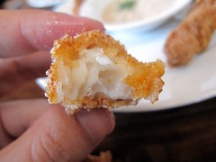 paschal's restaurant - catfish finger in bite by foodiebuddha