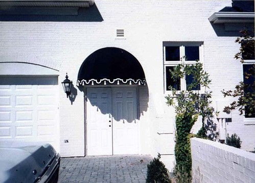 Dome awning with applique and tassels