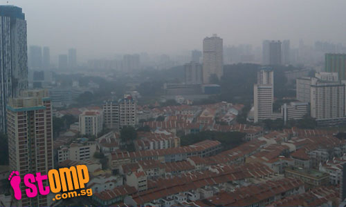  Haze darkens S'pore city view at International Plaza