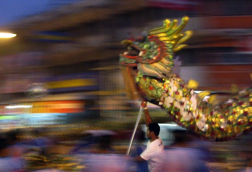 Dragon act at a street festival - Sukhothai, Thailand