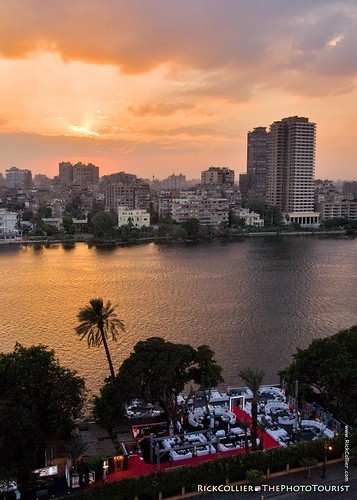 The Egyptian sunset over the Nile River, viewed from the balcony of the Conrad hotel in Cairo, Egypt.