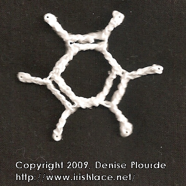 A simple crochet snowflake based on the benzene molecule