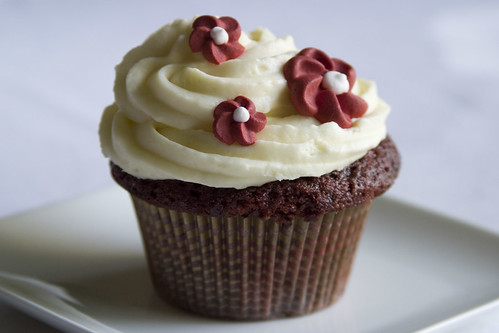 Red velvet cupcake with royal icing flowers