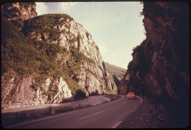 Inside Keystone Canyon Looking South Along the Richardson Highway The Cliffs at the Left Climb More Than 1000 Feet Above the Rushing Waters of the Lowe River Mile 766 near the Alaska Pipeline Route 081974 by The US National Archives