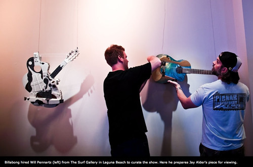 Will Pennartz of the Surf Gallery hangs Jays guitar