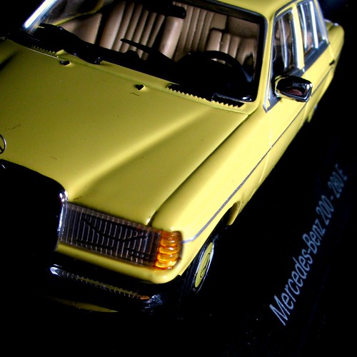 MercedesBenz W123 200E 280E Minichamps Diecast Model 143 Yellow