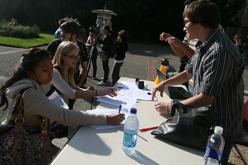 Junior Kevin Kunze (far right) organized a protest to gather signatures for a petition opposing the proposed schedule.  Photo by Melissa Stihl/Foghorn