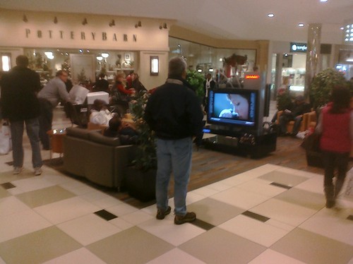 Ptw 12 Oaks mall, Guy friendly Big Wcreen Tvs in walkway with footb all