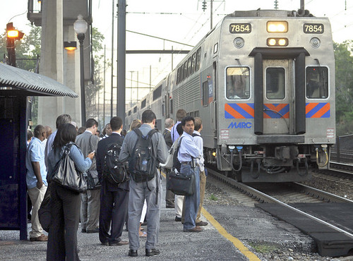 Morning commuters wait at the Halethorpe station to board the 7:13 a.m. MARC train to Washington