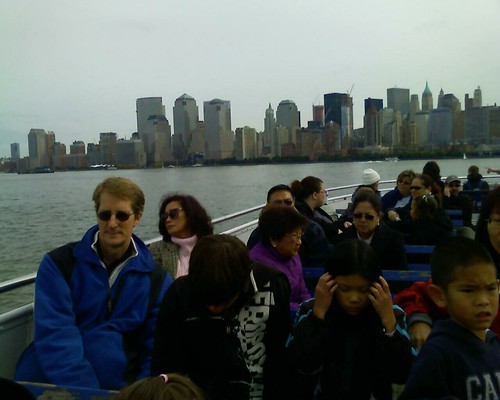 on board the ferry to the statue of Liberty.