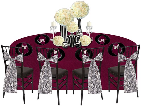 A beautiful zebra theme inspired tablescape that is rich in color and uber