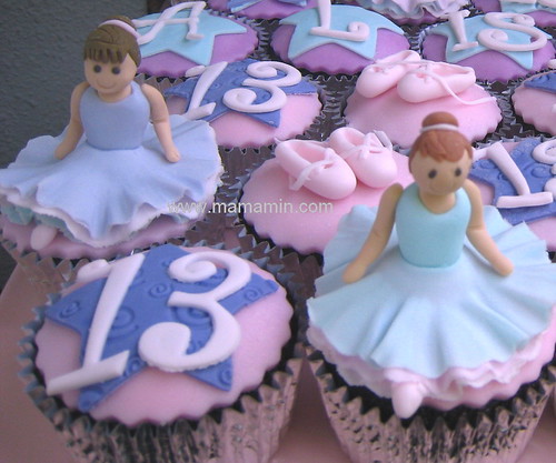 Baby ballerinas adorn the cupcakes