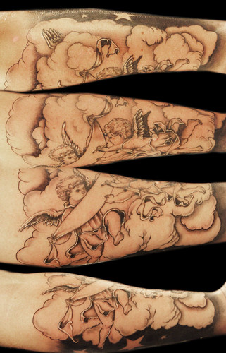 Cherub and clouds tattoo by Miguel Angel tattoo