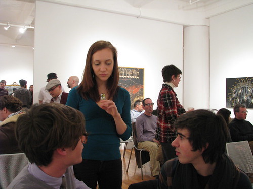 Our former intern talks to Zachary German, left, at the event.