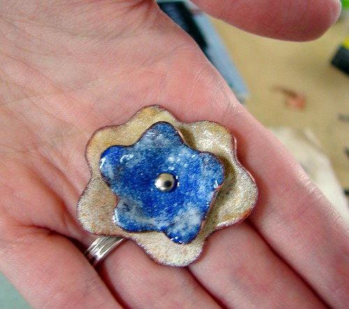 instructor's enameled pendant with a rivot