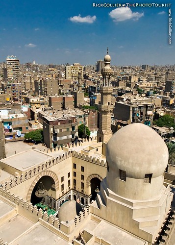 The more modern mosque next door dominates the foreground of this view of old Cairo from the top of the spiral minaret at Ibn Tulun.