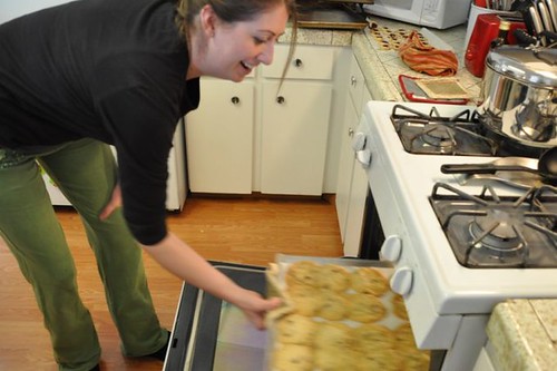 Cheyenne pulls cookies from the oven