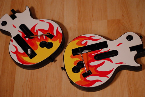 finished guitars after personalizing with a paint pen