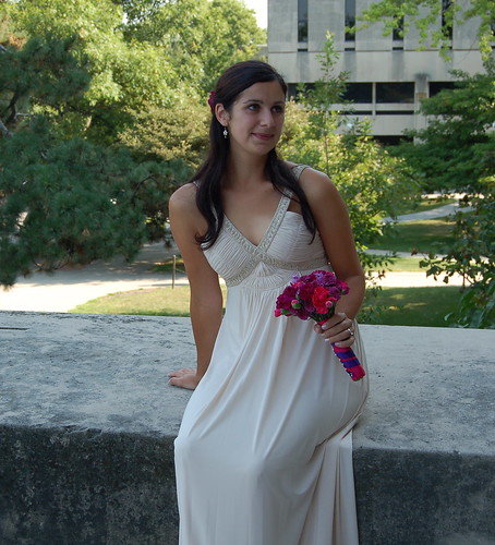 I wore a long champagne colored gown with a fuschia colored flower pinned in