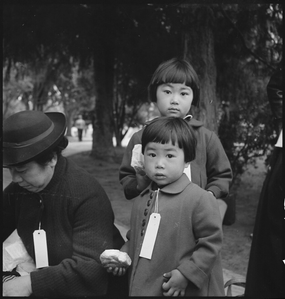 Two Children of the Mochida Family, with Their Parents, Awaiting Evacuation Bus