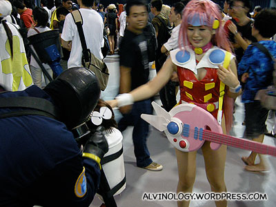 Fanciful guitar playing cosplayer