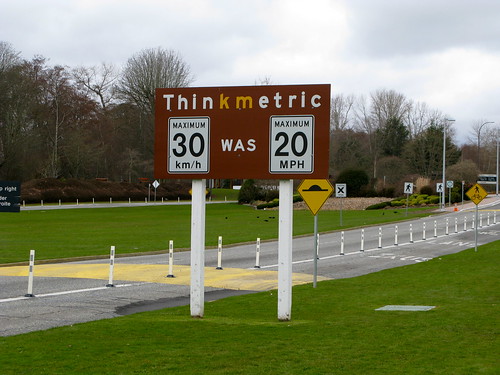 Think Metric sign