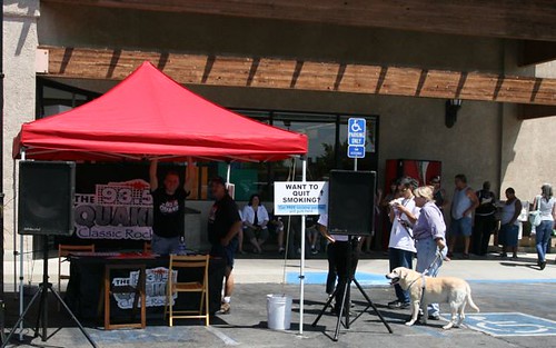 Setting up the LA Quits Table While Smokers Line Up Waiting for Free Quit Smoking Help
