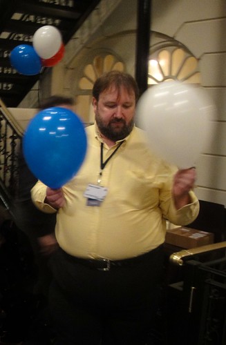 Steve Cooper inflating balloons