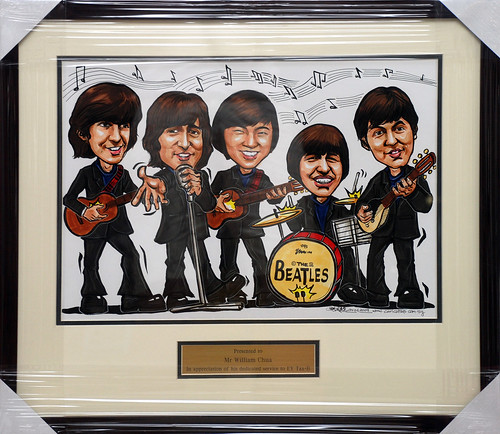 Beatles caricatures for Ernst & Young framed with metal engraving plate