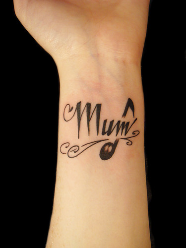 Mum and music note tattoo by Miguel Angel tattoo