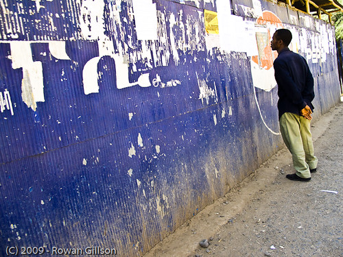 An Ethiopian man checks out the latest bulletins on a public wall in Addis Ababa..
