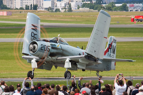 Warbird picture - A-1 Skyraider with running engine and folded wings at the Paris Air Show in 2009
