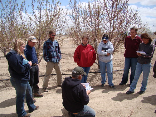 Rudy Garcia conducts field training during the Sustainable Agriculture Workshop to area farmers at the Deni’ Orchard on the Navajo Indian Reservation in Shiprock, N.M.