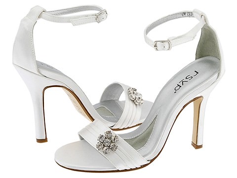 Wedding shoes with high heels and sandals with a strapshaped at the ankle