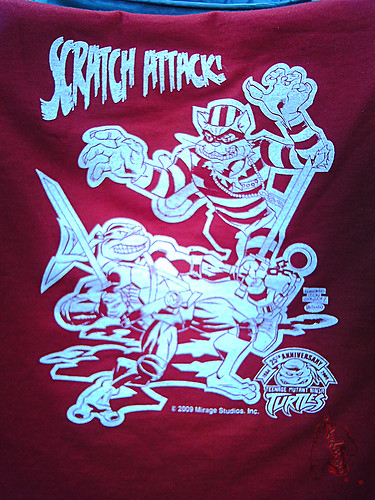 "Scratch Attack ! " - Jake Black benefit T-shirt ,True Red .. art by Fernando León González & Ryan Brown i (( 2009 ))