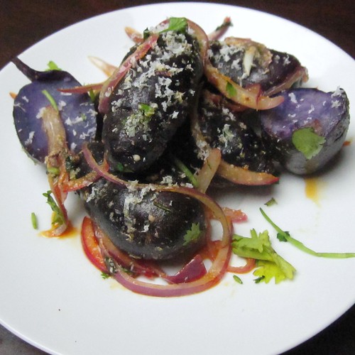 purple potatoes with cotija and onions