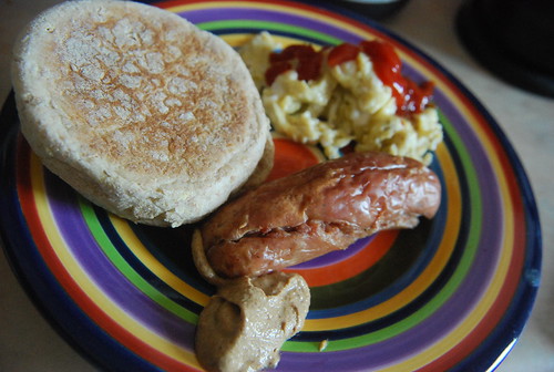 Sausage, scrambled eggs and English muffin