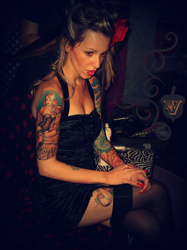 Tattooed Pinup model in stockings