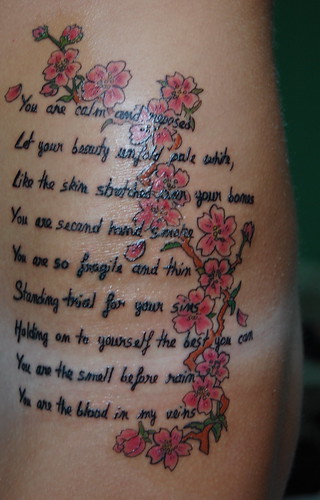 Cherry blossom tattoo with lyrics This s my latest and third tattoo 