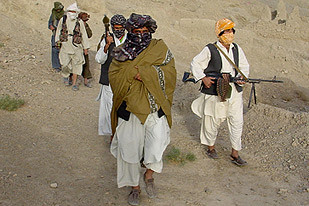 Taliban units on patrol in Afghanistan. The resistance movement to US/NATO occupation has issued a "Code of Conduct" manual. Casualties are mounting among both the Afghan people and the imperialist troops. by Pan-African News Wire File Photos