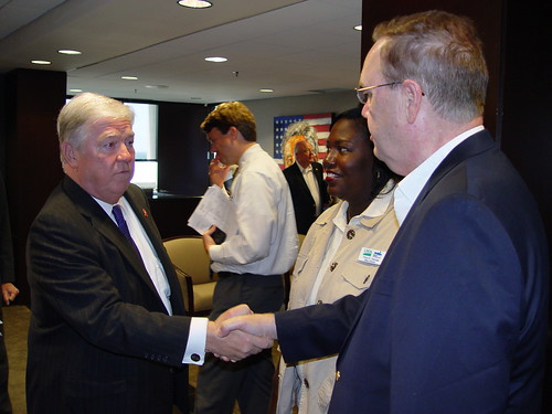 Mississippi Governor Haley Barbour greets USDA Under Secretary Dallas Tonsager and Mississippi State Director Trina George at the start of a briefing on the state of the flood damage in Mississippi.